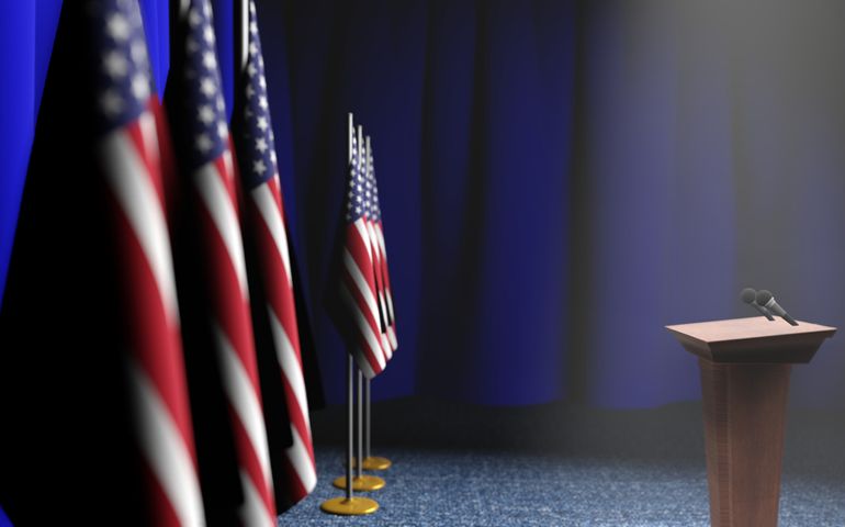 Podium speaker tribune with USA flags and coat arms