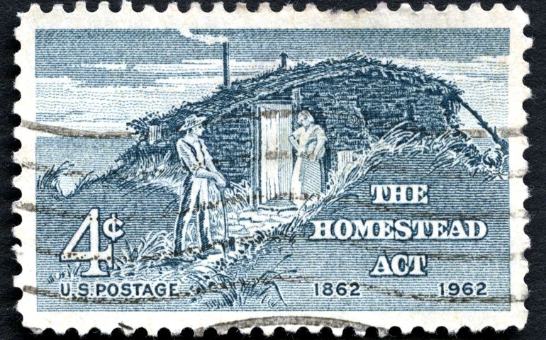 UNITED STATES OF AMERICA - CIRCA 1962: A used US postage stamp commemorating the 100th Anniversary since the 1862 Homestead Act