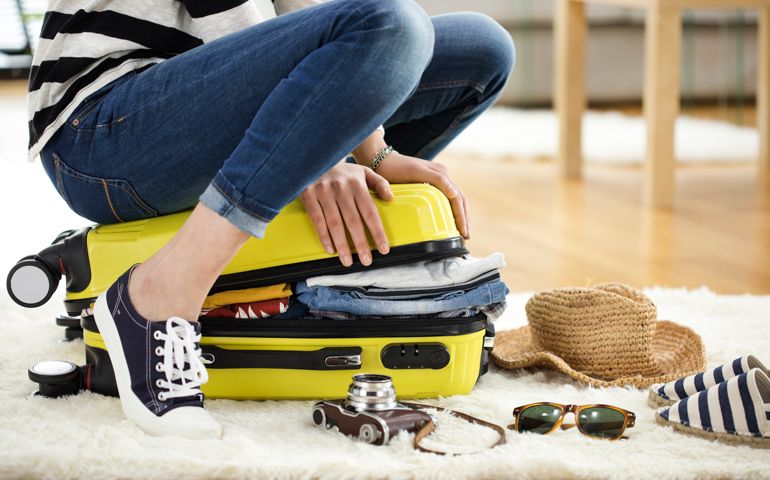Preparation travel suitcase at home