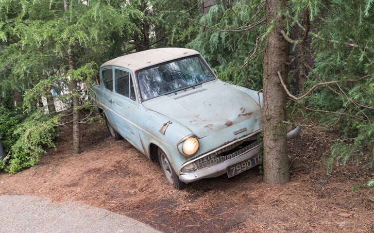 OSAKA, JAPAN - JUN 9, 2015 : Photo of Flying Ford Anglia crashing scene replica at The Wizarding World of Harry Potter, Universal Studio, Osaka, Japan.