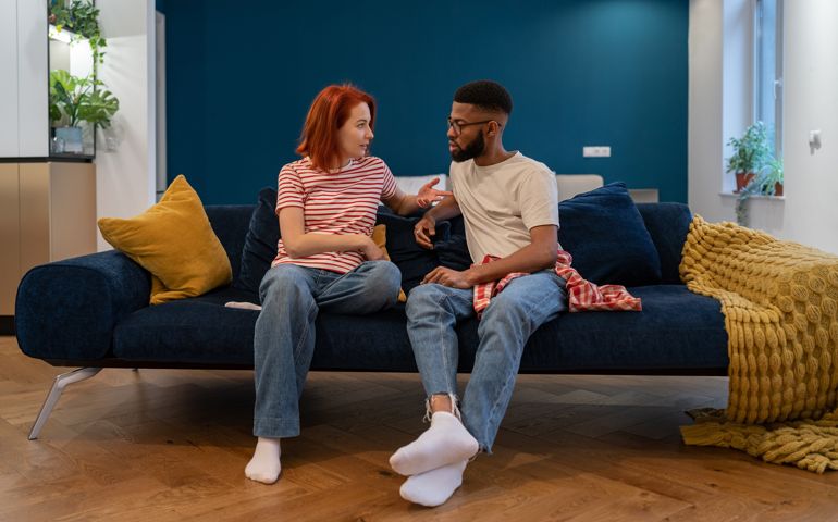 couple having a serious relationship conversation