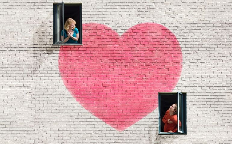 Wall with heart shape &amp; windows &amp; a couple