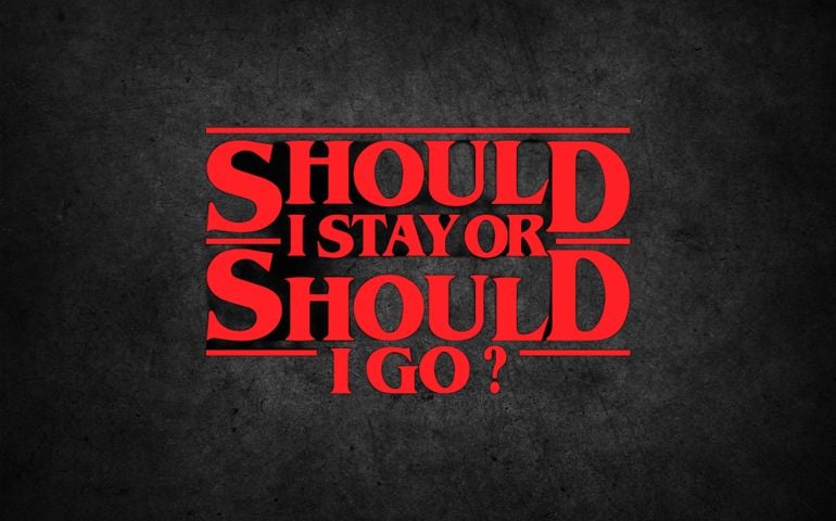 Bold red text on a dark, textured background reads “SHOULD I STAY OR SHOULD I GO?” in a font style matching the Stranger Things logo. The phrase references a recurring song from the series associated with Will Byers.