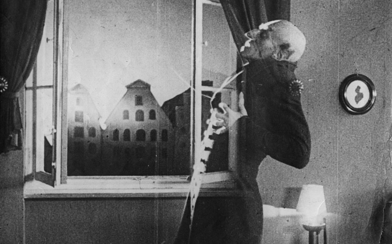 German actor Max Schreck (1879 - 1936), as the vampire Count Orlok, being destroyed by sunlight, in a still from F. W. Murnau's expressionist horror film, 'Nosferatu, Eine Symphonie Des Grauens', 1921. The film is based on Bram Stoker's novel 'Dracula' and was released in 1922.