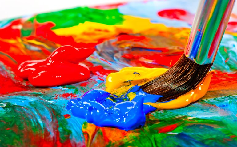 Art brush mixed paint on the palette