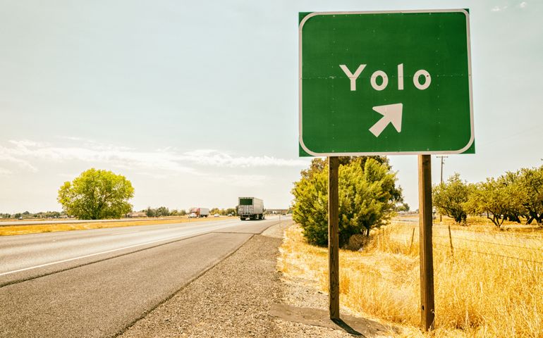 Yolo road sign. "You Only Live Once" concept