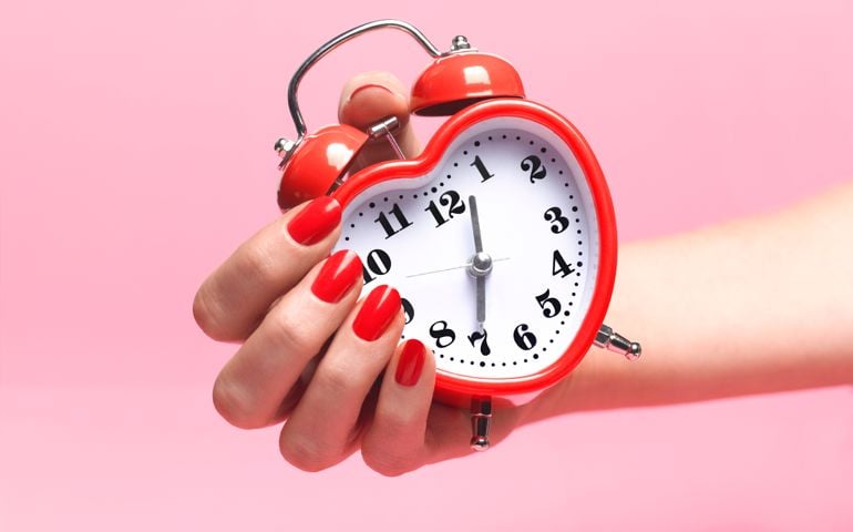 Woman with biological clock ticking