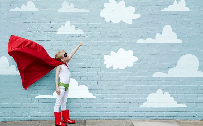 Boy dressed as a superhero