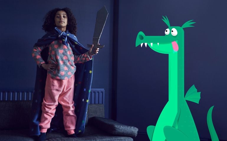 Girl dressed as a knight with dragon