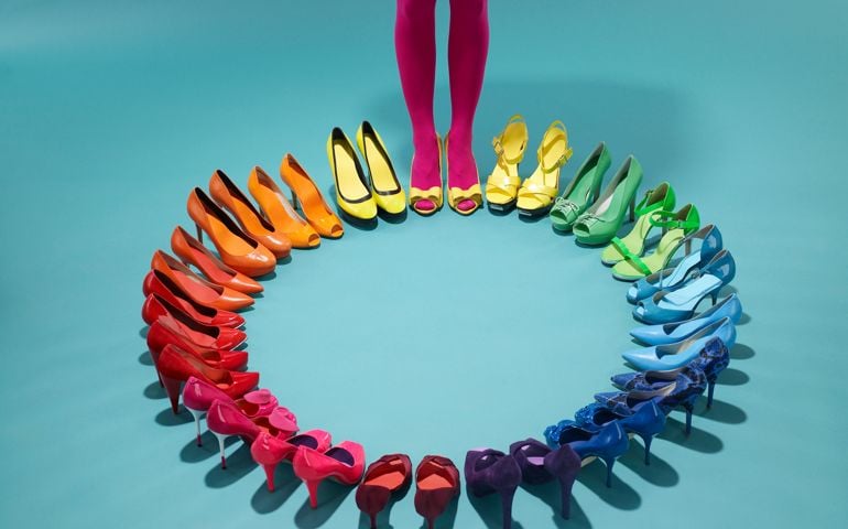 Colorful shoes form a color wheel with legs