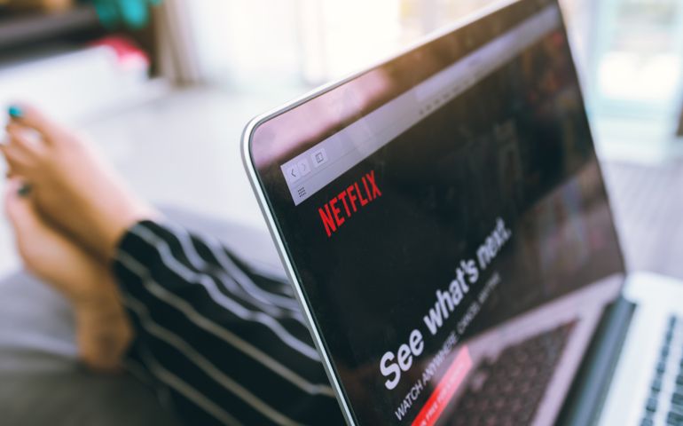 Close up Netflix website in laptop screen. Netflix being popular internationally.