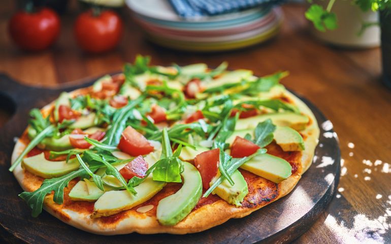 Vegan Avocado Pizza with Tomato and Arugula