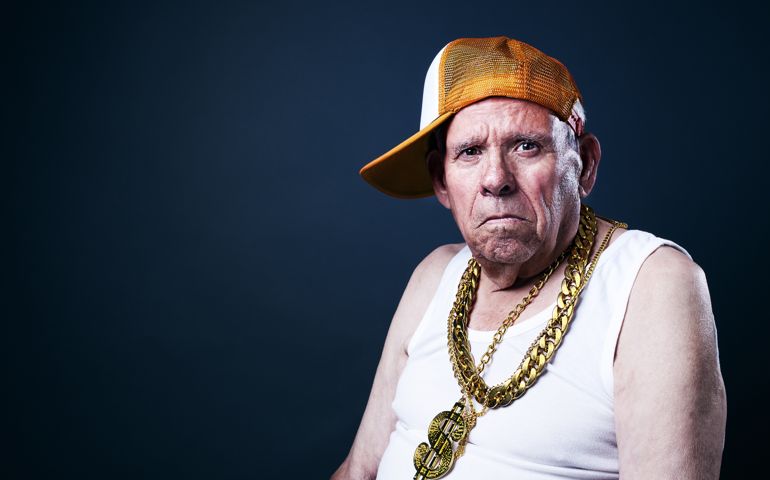 Grandfather with a cap and golden chains