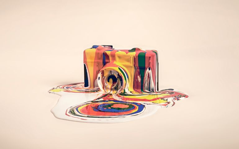 camera covered in paint