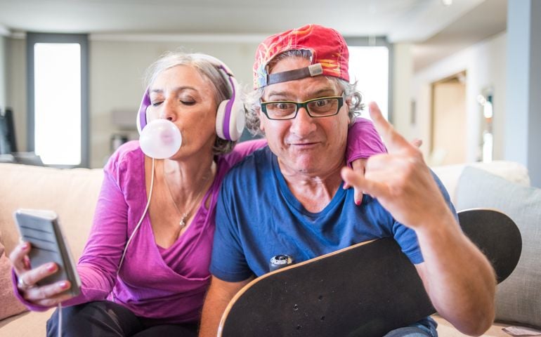 Young at heart grandparents series: Listening music and rock sign
