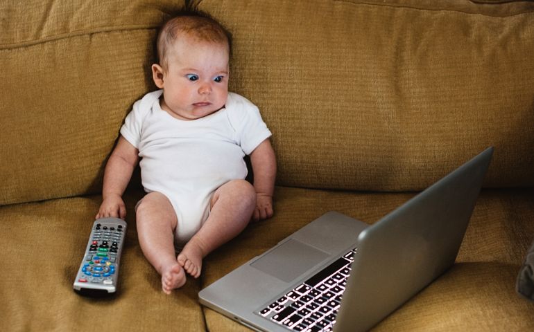Baby watching laptop