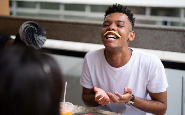 Group of young people having fun in a restaurant