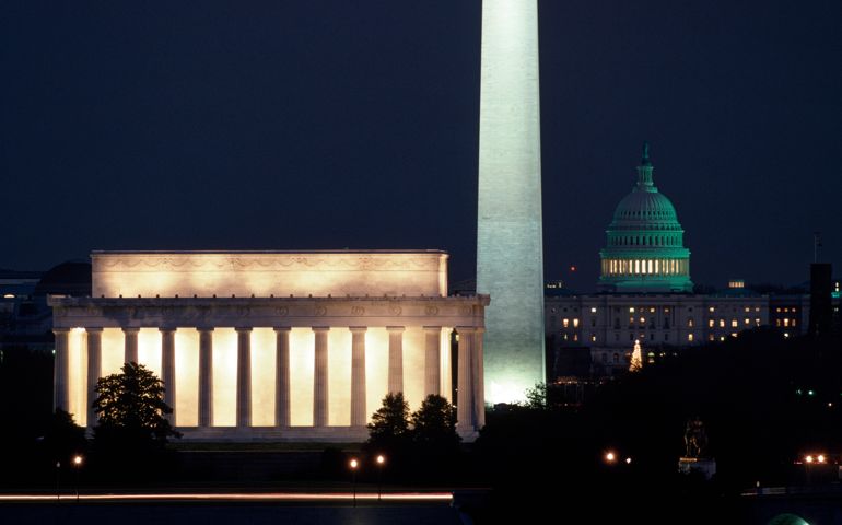 Night view of Lincoln Memorial, Washington Monument and the US Capitol Building. Washington, DC