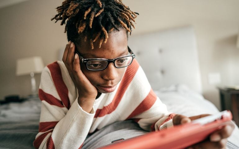 Teen with tablet
