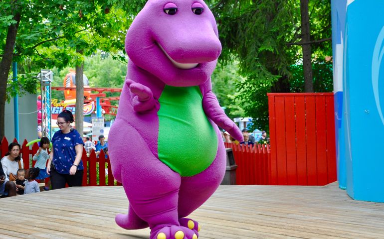 Toronto, Canada - August 1, 2018: Barney performing on stage at Canada's Wonderland.