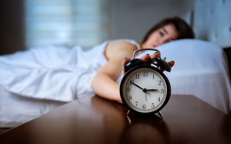 Insomnia patient woman in bed
