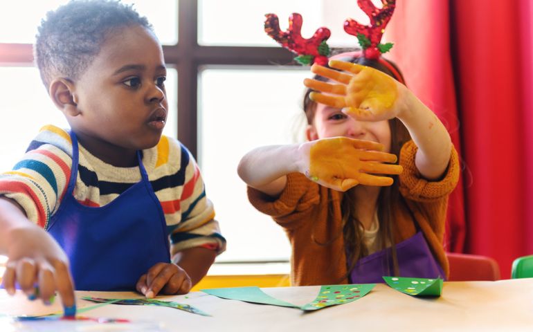 Preschool kids doing homemade decorations for Christmas, Quebec, Canada