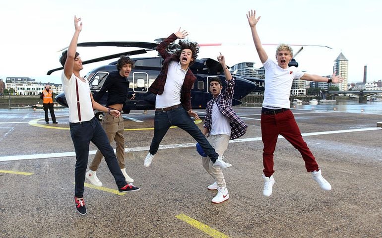Liam Payne, Louis Tomlinson, Harry Styles, Zain Malik and Niall Horan of One Direction travel in a luxury helicopter to Glasgow, Manchester and London on September 11, 2011. The tour was taken in a luxury helicopter to launch their first single 'What Makes You Beautiful' released on the 12th September.