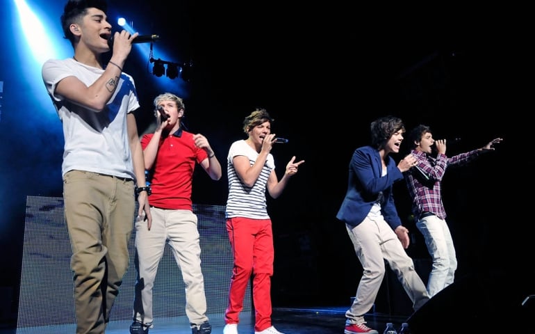 Singers Zayn Malik, Niall Horan, Louis Tomlinson, Harry Styles and Liam Payne of the British pop group One Direction perform live at Gibson Amphitheatre on June 16, 2012 in Universal City, California.