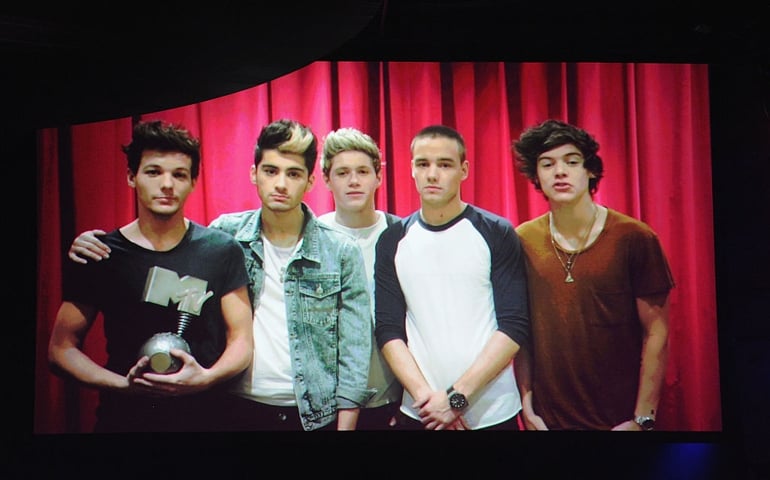 Liam Payne, Louis Tomlinson, Niall Horan, Zayn Malik and Harry Styles of One Direction accept the award for Biggest Fans via video link onstage during the MTV EMA's 2012 at Festhalle Frankfurt on November 11, 2012 in Frankfurt am Main, Germany.