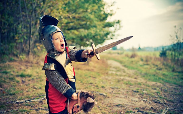 Brave little knight ordering his fellow knights to charge at the enemy lines.