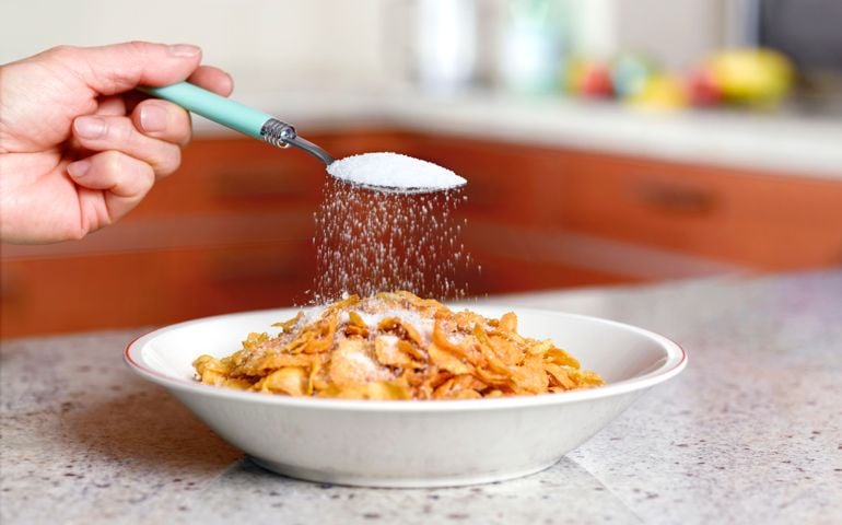 Putting to much sugar on corn flakes