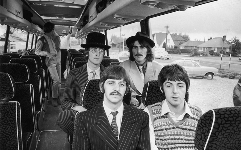 12th September 1967: The Beatles travel by coach to the West Country, for some location work on 'The Magical Mystery Tour' film. Clockwise from back left : John Lennon (1940 - 1980), George Harrison (1943 - 2001), Paul McCartney and Ringo Starr.