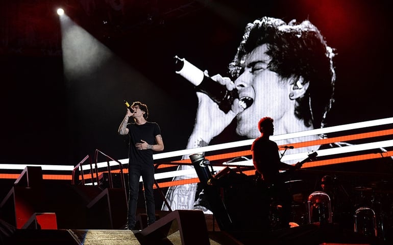 Zayn Malik of One Direction performs onstage during the "Where We Are" tour at Met Life Stadium on August 4, 2014 in New York City.