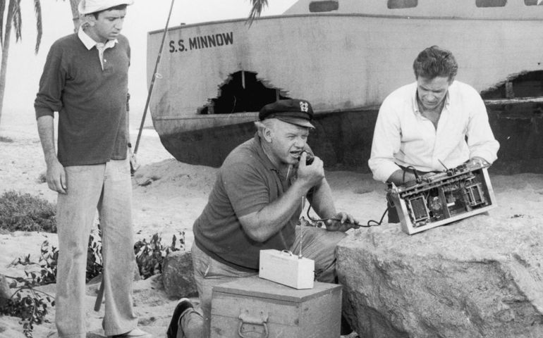 Circa 1966, American actors, left to right, Bob Denver, Alan Hale Jr. (1918-1990) and Russell Johnson attempt to use a homemade CB radio to contact civilization in a still from the television comedy show 'Gilligan's Island'.