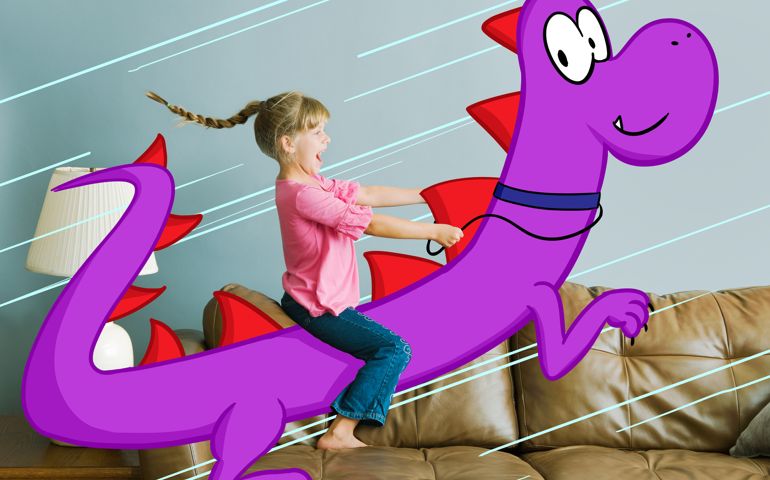 7 year old girl riding on back of illustrated dragon in domestic living room