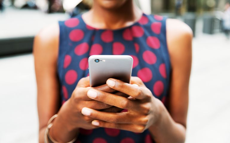 Closer up of woman using smart phone