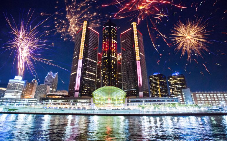 Fireworks exploding behind downtown Detroit, Michigan.