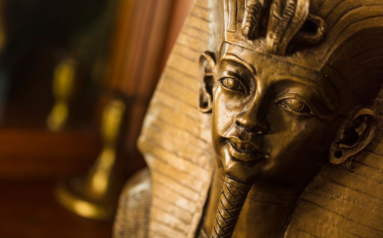 Bronze color bust of Egyptian King Tutankhamun made with plaster.