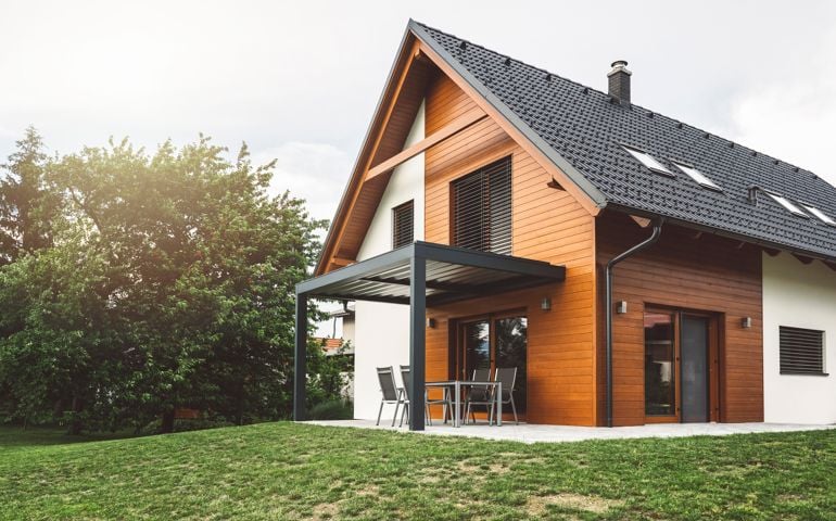 Customized wooden holiday villa, nature friendly mateirals, black roof, wooden facade, minimalistic architecture, beautiful backyard perfect for picnics, holiday villa for the upper class, perfect for a weekend off.