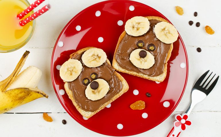 Funny bear face sandwich for kids snack food. Creative breakfast idea for kids