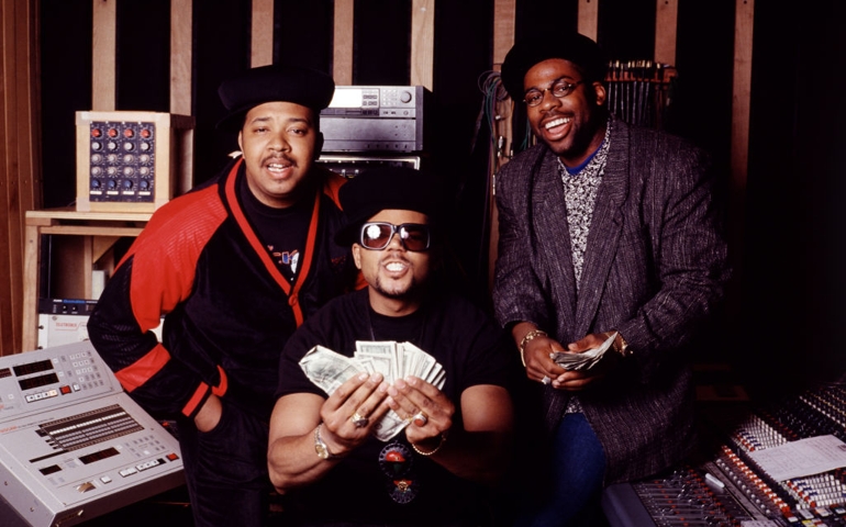 Portrait of American Rap group Run-DMC as they pose in a recording studio, New York, April 26, 1990. Pictured are, from left, DJ Run (born Joseph Simmons), DMC (born Darryl McDaniel) and Jam Master Jay (born Jason Mizell, 1965- 2002)