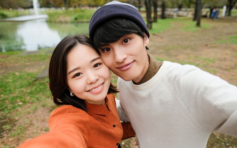 Young couple dating in park