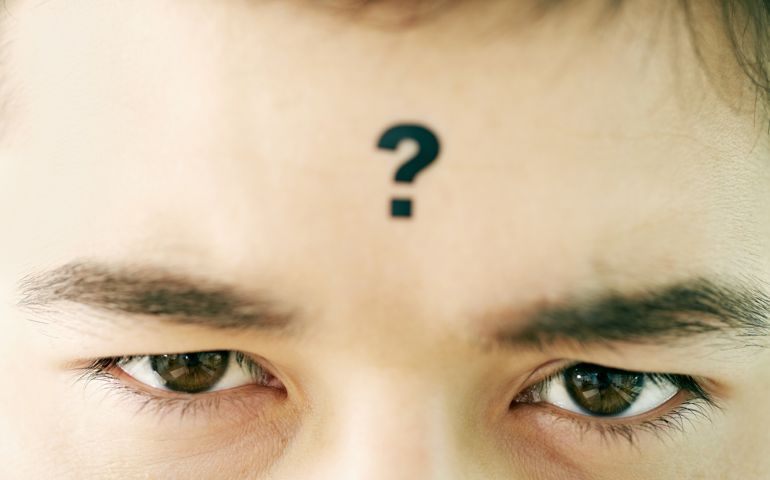 Close-up of face of man having some problem