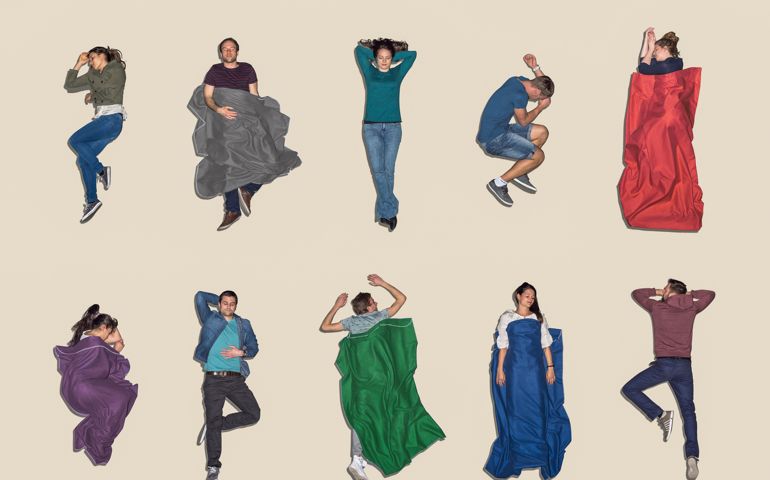 Group of people lying down sleeping, Aerial View