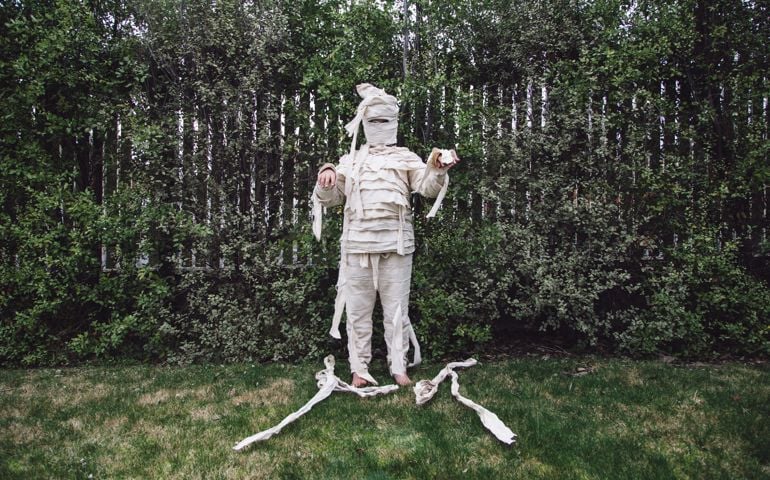 Child dressed in home made egyptian mummy costume