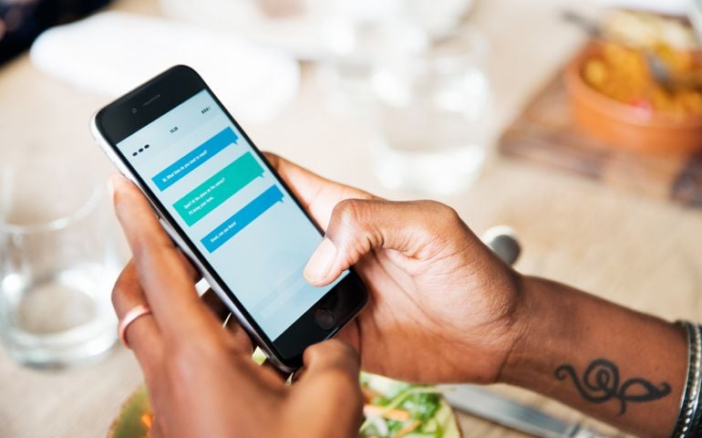 Close up of smart phone at lunch.
