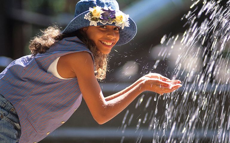 NEW YORK - JUNE 1993: Christina Vidal poses next to a fountain in June 1993 in a park in New York City. Vidal played "Angie Vega" in the 1993 Michael J. Fox movie 'Life With Mikey'. A Native of Queens, NY, Vidal began her career in 'Life With Mikey' and then moving on to various other television and film projects such as 'Freaky Friday' starring Lindsay Lohan. Most recently she has had a stint on the television show 'Girlfriends'.