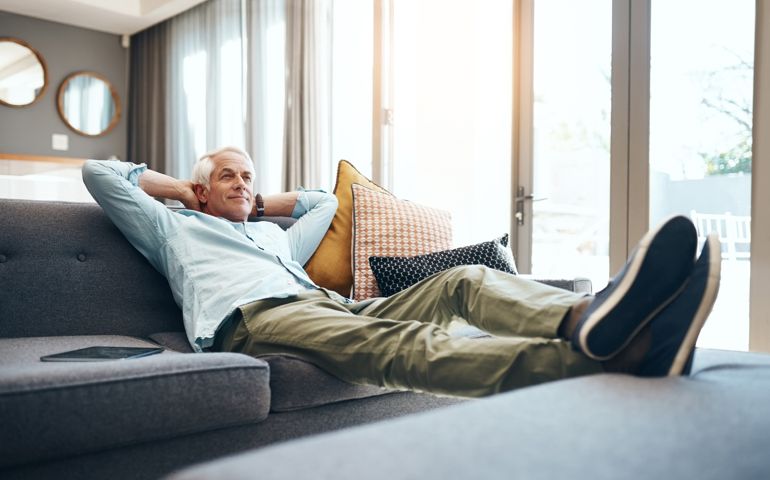 Shot of a senior man relaxing on the sofa at home