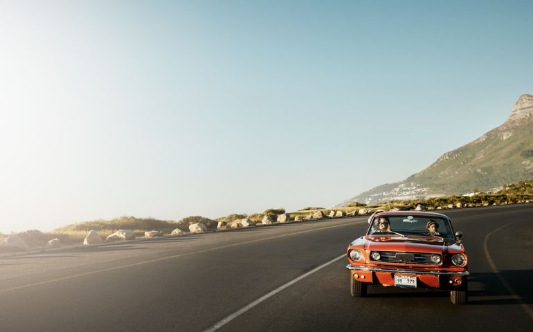 Shot of a young couple enjoying a road trip together