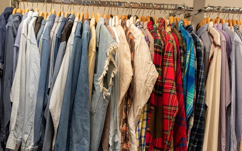 Rail of men’s shirts in a vintage clothing store
